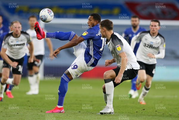 140720 - Cardiff City v Derby County - SkyBet Championship - Nathaniel Mendez-Laing of Cardiff City chips the ball over Craig Forsyth of Derby County