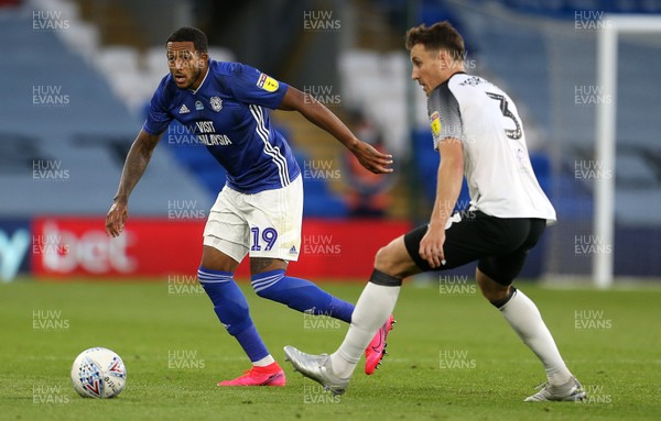 140720 - Cardiff City v Derby County - SkyBet Championship - Nathaniel Mendez-Laing of Cardiff City is challenged by Craig Forsyth of Derby County