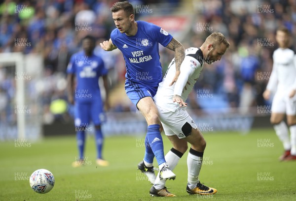 300917 - Cardiff City v Derby County, Sky Bet Championship - Joe Ralls of Cardiff City gets past Johnny Russell of Derby County