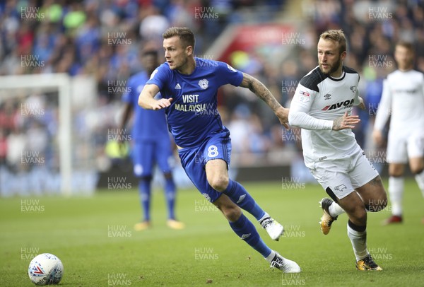 300917 - Cardiff City v Derby County, Sky Bet Championship - Joe Ralls of Cardiff City gets past Johnny Russell of Derby County