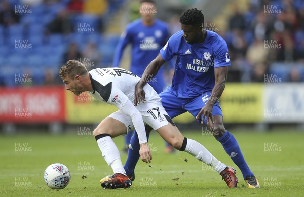 300917 - Cardiff City v Derby County, Sky Bet Championship - Sam Winnall of Derby County holds off the challenge from Bruno Ecuele Manga of Cardiff City