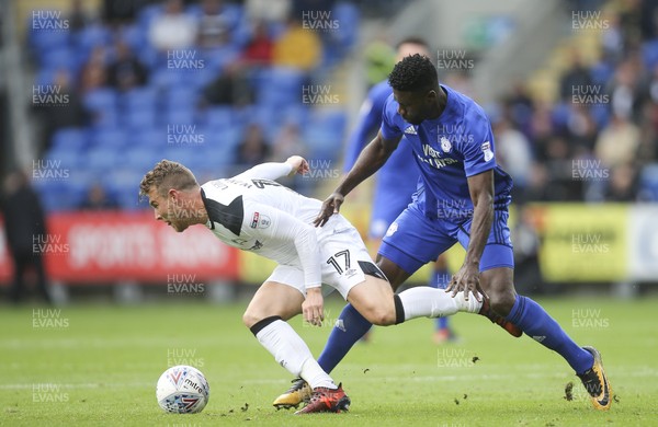 300917 - Cardiff City v Derby County, Sky Bet Championship - Sam Winnall of Derby County holds off the challenge from Bruno Ecuele Manga of Cardiff City