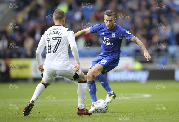 300917 - Cardiff City v Derby County, Sky Bet Championship - Joe Ralls of Cardiff City takes on Sam Winnall of Derby County