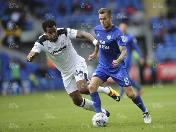 300917 - Cardiff City v Derby County, Sky Bet Championship - Joe Ralls of Cardiff City gets past Tom Huddlestone of Derby County