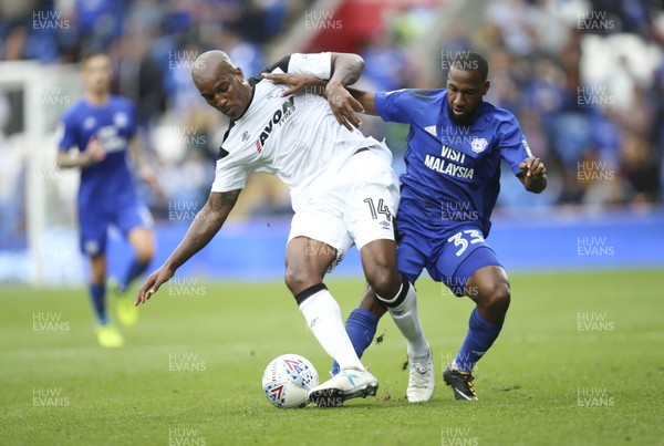 300917 - Cardiff City v Derby County, Sky Bet Championship - Curtis Davies of Derby County and Sol Bamba of Cardiff City compete for the ball