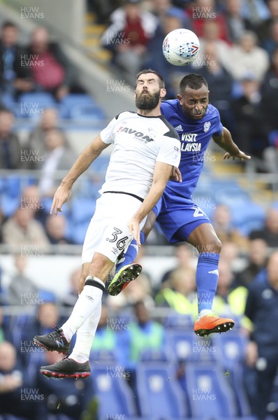 300917 - Cardiff City v Derby County, Sky Bet Championship - Loic Damour of Cardiff City and Joe Ledley of Derby County compete for the ball