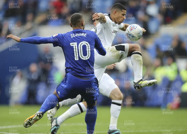 300917 - Cardiff City v Derby County, Sky Bet Championship - Curtis Davies of Derby County controls the ball as Kenneth Zohore of Cardiff City challenges