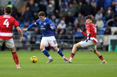 131225 - Cardiff City v Doncaster Rovers - SkyBet League One - Calum Chambers of Cardiff is challenged by Charlie Crew of Doncaster 