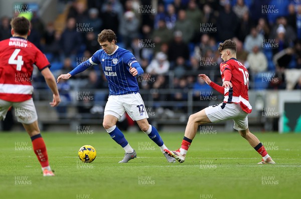 131225 - Cardiff City v Doncaster Rovers - SkyBet League One - Calum Chambers of Cardiff is challenged by Charlie Crew of Doncaster 