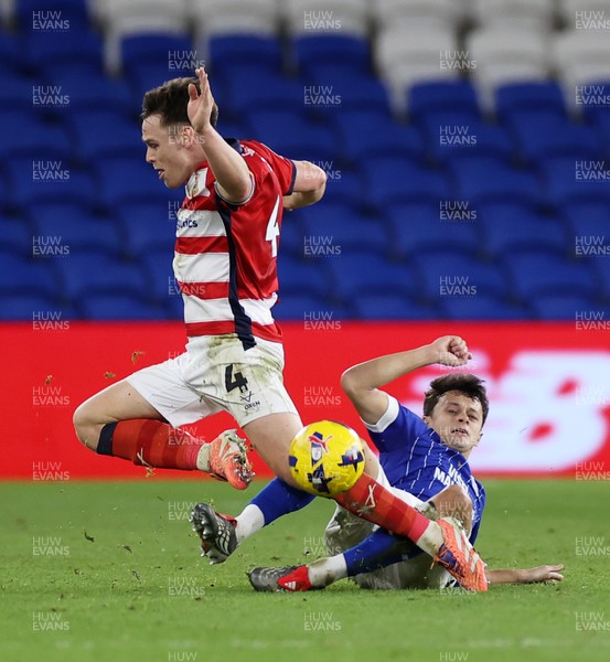 131225 - Cardiff City v Doncaster Rovers - SkyBet League One - Owen Bailey of Doncaster is tackled by Perry Ng of Cardiff 