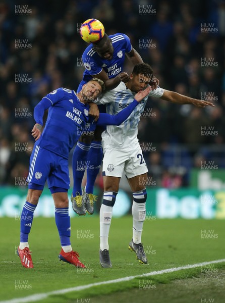 260219 - Cardiff City v Everton, Premier League - Sol Bamba of Cardiff City gets above Joe Bennett of Cardiff City and Dominic Calvert-Lewin of Everton to head the ball