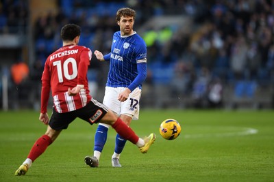 261225 - Cardiff City v Exeter City - Sky Bet League 1 - Calum Chambers of Cardiff City is challenged by Jack Aitchison of Exeter