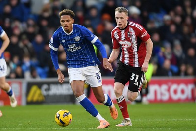 261225 - Cardiff City v Exeter City - Sky Bet League 1 - Omari Kellyman of Cardiff City is challenged by Jake Doyle-Hayes of Exeter