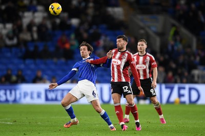 261225 - Cardiff City v Exeter City - Sky Bet League 1 - Ryan Wintle of Cardiff City is challenged by Reece Cole of Exeter