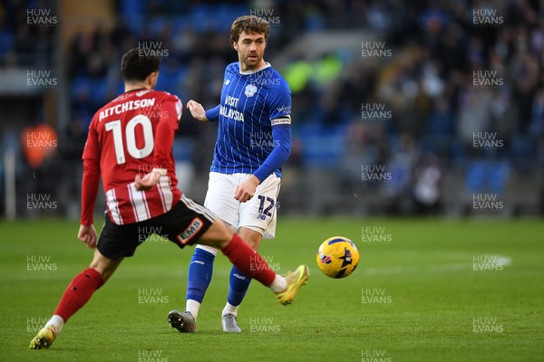 261225 - Cardiff City v Exeter City - Sky Bet League 1 - Calum Chambers of Cardiff City is challenged by Jack Aitchison of Exeter