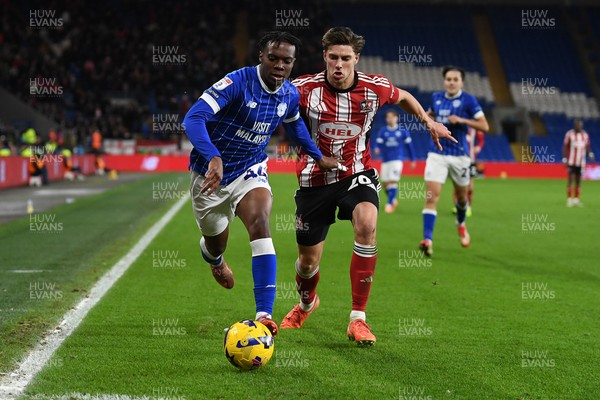 261225 - Cardiff City v Exeter City - Sky Bet League 1 - Ronan Kpakio of Cardiff City is challenged by Luca Woodhouse of Exeter