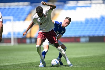 110726 - Cardiff City v FC Midtjylland - Preseason Friendly - David Turnbull of Cardiff City is challenged by Philip Billing of FC Midtylland