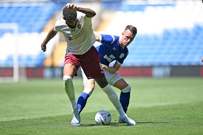 110726 - Cardiff City v FC Midtjylland - Preseason Friendly - David Turnbull of Cardiff City is challenged by Philip Billing of FC Midtylland