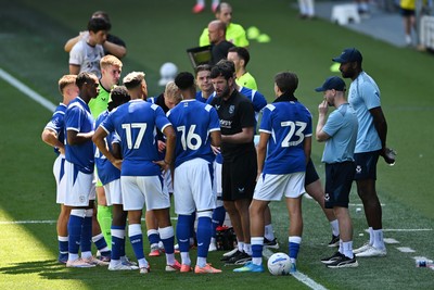 110726 - Cardiff City v FC Midtjylland - Preseason Friendly - Brian Barry-Murphy, Cardiff City Manager consoles his team during the hydration break