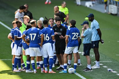 110726 - Cardiff City v FC Midtjylland - Preseason Friendly - Brian Barry-Murphy, Cardiff City Manager consoles his team during the hydration break
