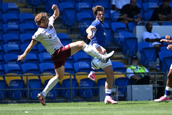 110726 - Cardiff City v FC Midtjylland - Preseason Friendly - Ollie Tanner of Cardiff City is challenged by Mads Sorensen Bech of FC Midtylland