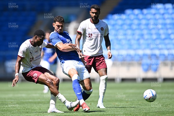 110726 - Cardiff City v FC Midtjylland - Preseason Friendly - Yousef Salech of Cardiff City is challenged by Ousmane Diao of FC Midtylland
