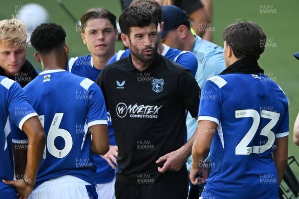 110726 - Cardiff City v FC Midtjylland - Preseason Friendly - Brian Barry-Murphy, Cardiff City Manager consoles his team during the hydration break