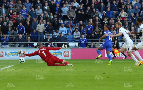 201018 - Cardiff City v Fulham, Premier League - Bobby Decordova-Reid of Cardiff City shoots past Fulham goalkeeper Marcus Bettinelli to score the second goal