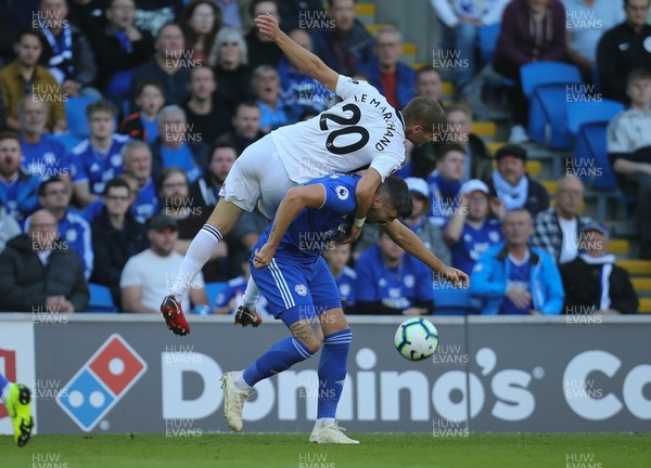 201018 - Cardiff City v Fulham, Premier League - Maxime Le Marchand of Fulham puts Callum Paterson of Cardiff City under pressure as he looks to win the ball