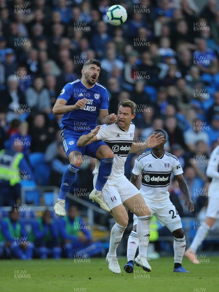 201018 - Cardiff City v Fulham, Premier League - Callum Paterson of Cardiff City is caught with an elbow by Kevin McDonald of Fulham as he goes for the ball