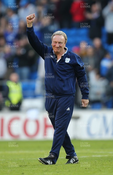 201018 - Cardiff City v Fulham, Premier League - Cardiff City manager Neil Warnock celebrates City's first Premier League win at the end of the match