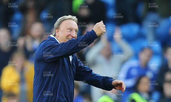 201018 - Cardiff City v Fulham, Premier League - Cardiff City manager Neil Warnock celebrates City's first Premier League win at the end of the match