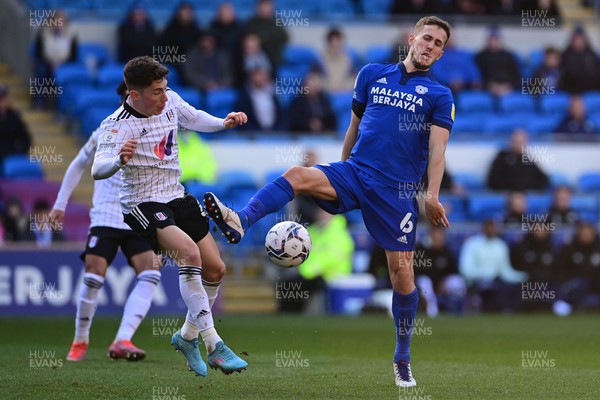 260222 - Cardiff City v Fulham - Sky Bet Championship - Harry Wilson of Fulham under pressure from Will Vaulks of Cardiff City
