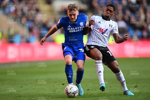 260222 - Cardiff City v Fulham - Sky Bet Championship - Isaak Davies of Cardiff City battles with Ivan Cavaleiro of Fulham 