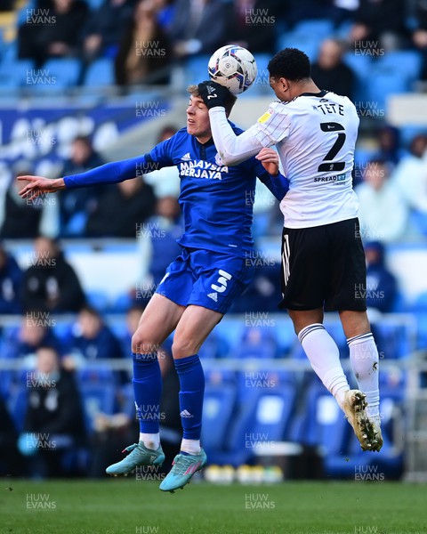 260222 - Cardiff City v Fulham - Sky Bet Championship - Joel Bagan of Cardiff City under pressure from Kenny Tete of Fulham 