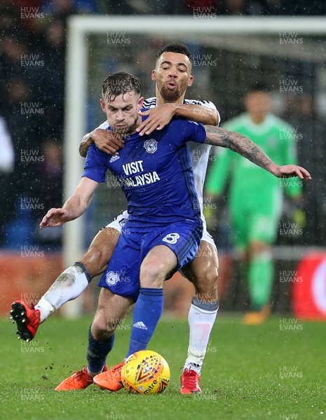 261217 - Cardiff City v Fulham - SkyBet Championship - Joe Ralls of Cardiff City is tackled by Ryan Fredericks of Fulham