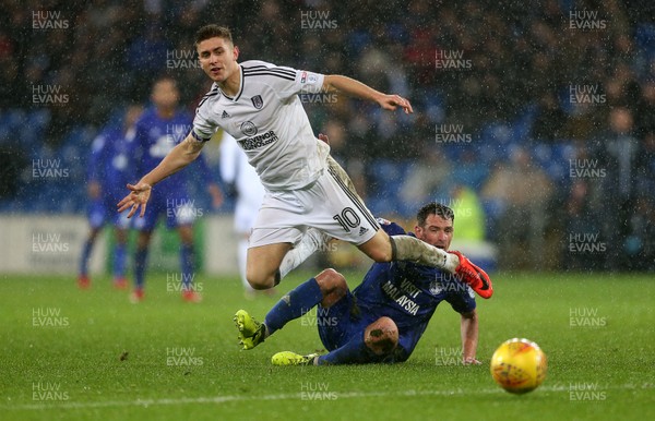 261217 - Cardiff City v Fulham - SkyBet Championship - Tom Cairney of Fulham is tackled by Craig Bryson of Cardiff City