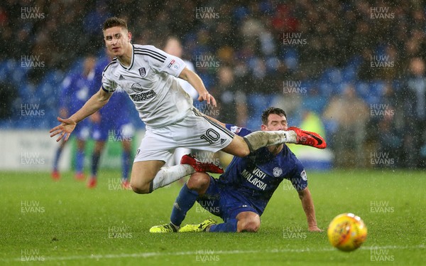 261217 - Cardiff City v Fulham - SkyBet Championship - Tom Cairney of Fulham is tackled by Craig Bryson of Cardiff City