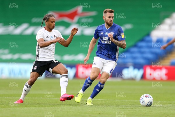 270720 - Cardiff City v Fulham - SkyBet Championship Play off - First leg - Joe Ralls of Cardiff City is challenged by Bobby Reid of Fulham