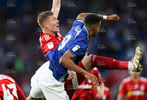 300819 - Cardiff City v Fulham, Sky Bet Championship - Robert Glatzel of Cardiff City challenges Alfie Mawson of Fulham for the ball