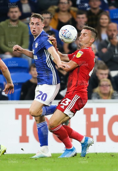 300819 - Cardiff City v Fulham, Sky Bet Championship - Gavin Whyte of Cardiff City is challenged for the ball by Joe Bryan of Fulham