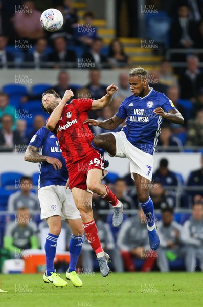 300819 - Cardiff City v Fulham, Sky Bet Championship - Harry Arter of Fulham is challenged by Leandro Bacuna of Cardiff City