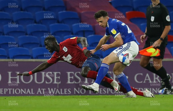 011220 - Cardiff City v Huddersfield Town, Sky Bet Championship - Mouhamadou-Naby Sarr of Huddersfield Town is brought down by Mark Harris of Cardiff City