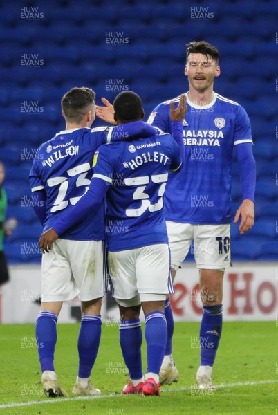 011220 - Cardiff City v Huddersfield Town, Sky Bet Championship - Kieffer Moore of Cardiff City celebrates with Harry Wilson of Cardiff City and Junior Hoilett of Cardiff City after he scores the second goal of the match