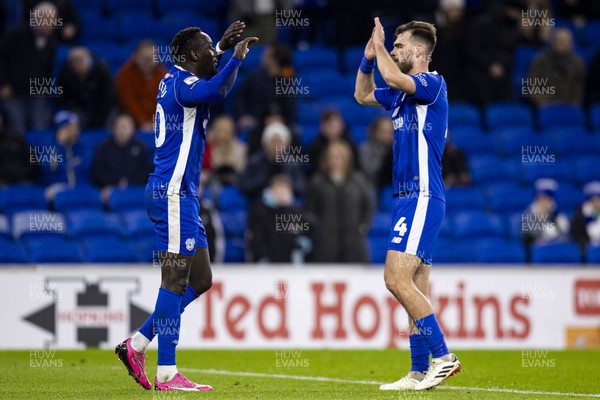 060324 - Cardiff City v Huddersfield Town - Sky Bet Championship - Famara Diedhiou of Cardiff City celebrates scoring his sides first goal with Dimitris Goutas of Cardiff City