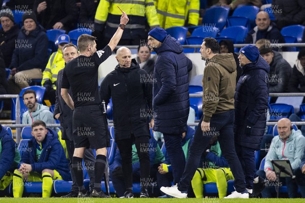 060324 - Cardiff City v Huddersfield Town - Sky Bet Championship - Cardiff goalkeeper coach Mario Galinovic is shown a red card by Match Referee Matthew Donohue
