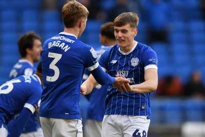 061225 - Cardiff City v Huddersfield Town - Sky Bet League 1 - Dylan Lawlor of Cardiff City celebrates with Joel Bagan of Cardiff City after Yousef Salech of Cardiff City’s opening goal