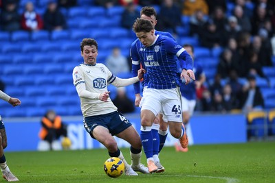 061225 - Cardiff City v Huddersfield Town - Sky Bet League 1 - Cian Ashford of Cardiff City is challenged by Ryan Ledson of Huddersfield