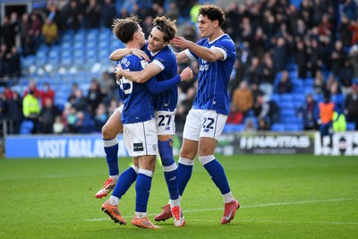 061225 - Cardiff City v Huddersfield Town - Sky Bet League 1 - Yousef Salech of Cardiff City celebrates scoring a goal with team mates
