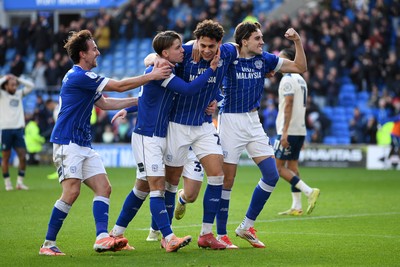 061225 - Cardiff City v Huddersfield Town - Sky Bet League 1 - Yousef Salech of Cardiff City celebrates scoring a goal with team mates